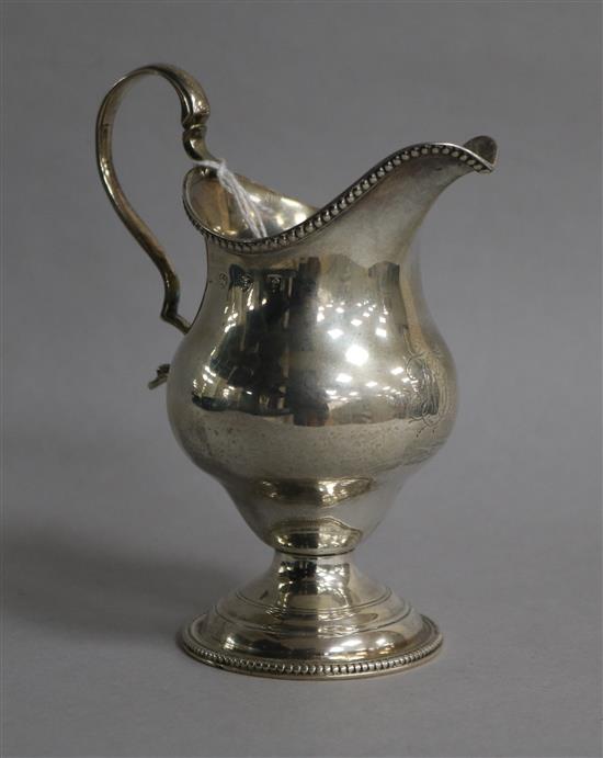 A George III silver inverted pear shaped cream jug, London, 1781, 12.3cm.